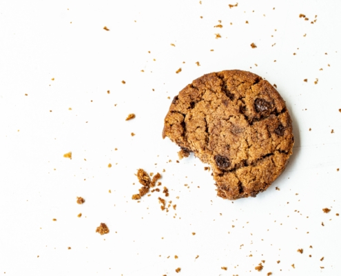 brown round cookie on white surface
