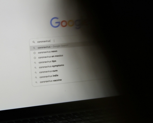 black laptop computer turned on displaying google search