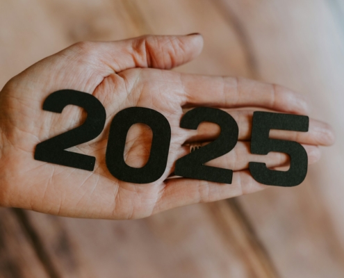 A person's hand holding the number twenty twenty twenty twenty twenty twenty twenty twenty