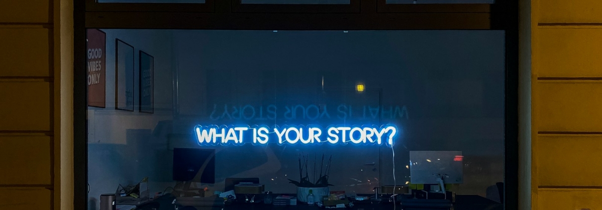 black flat screen tv turned on at the living room